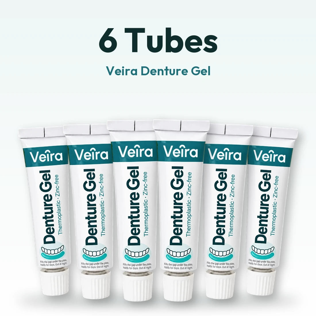 Six tubes of Veira Denture Gel in a row.