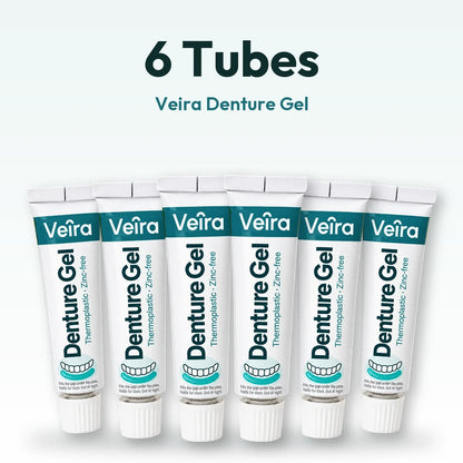 Six tubes of Veira Denture Gel in a row.